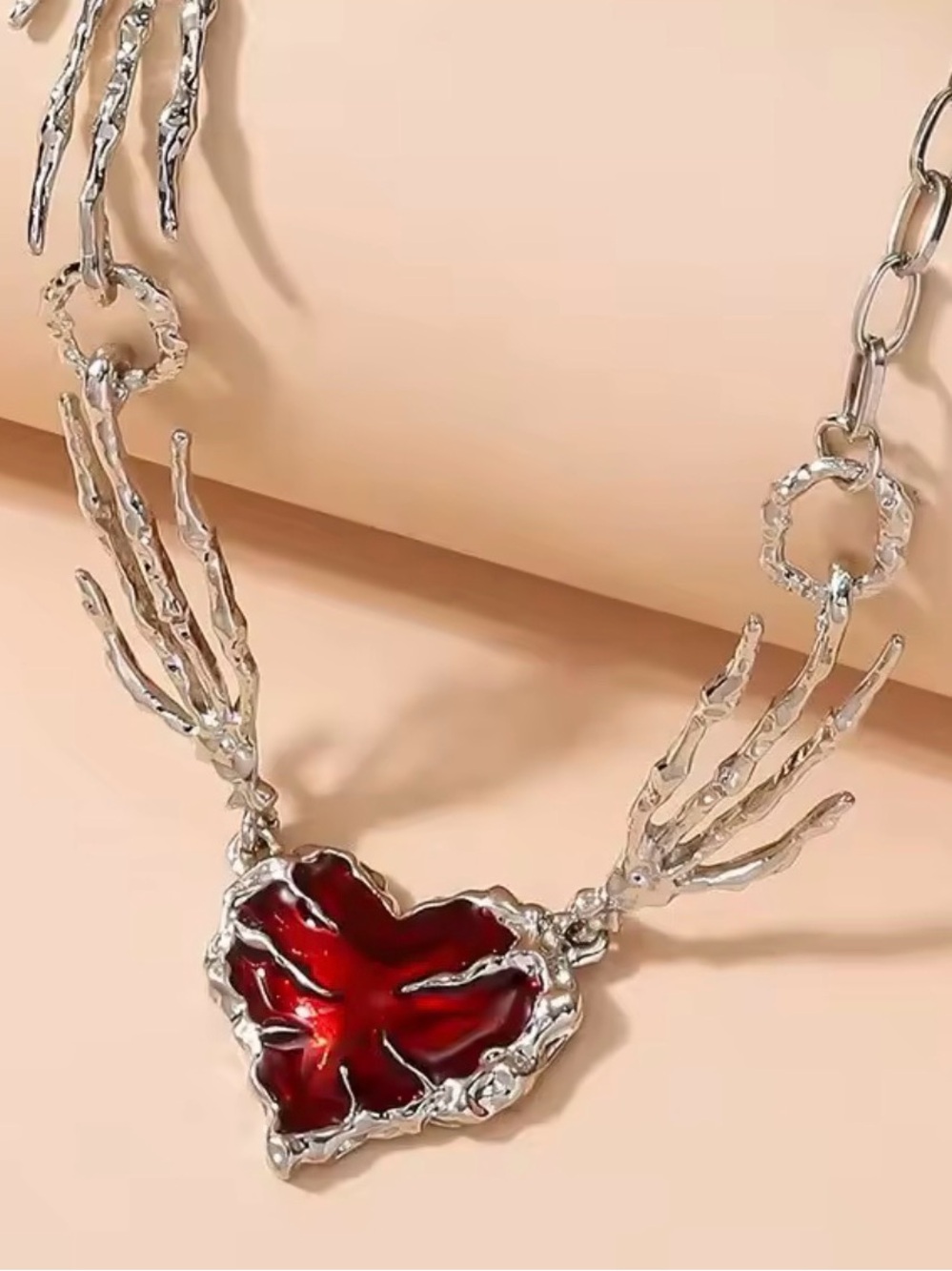 Silver Tone Red Heart Pendant Necklace with Winged Skeleton Detail